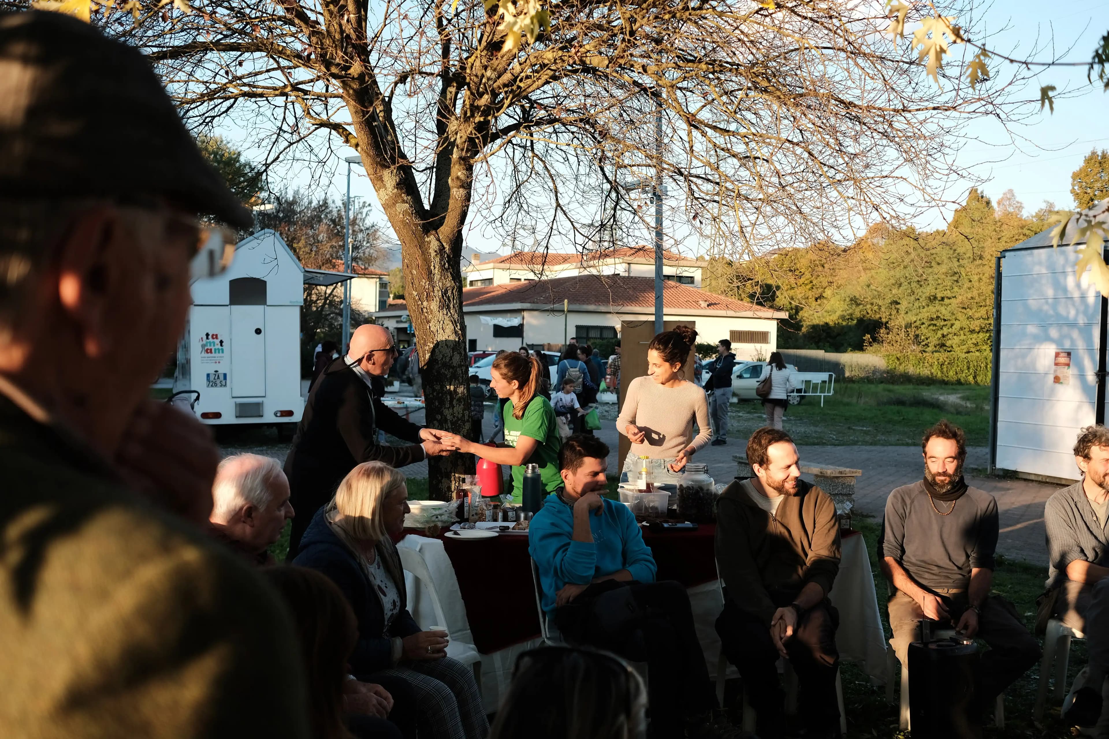 Outdoor community gathering with diverse people